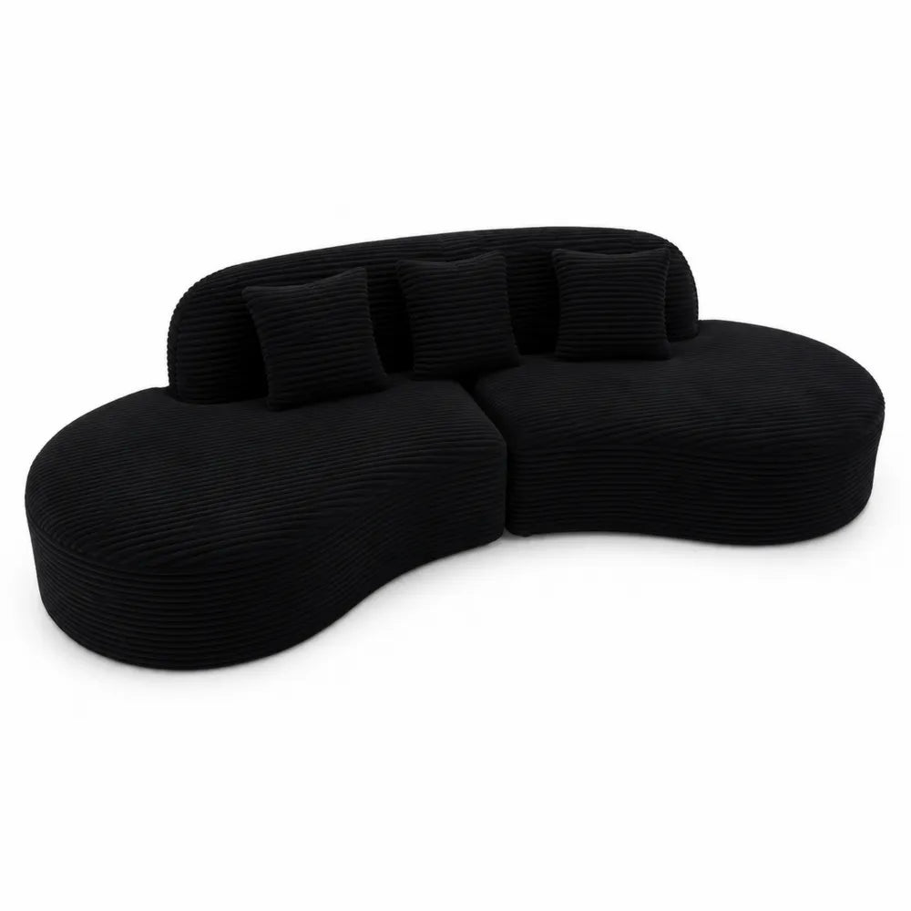 Canapé courbe en velours côtelé noir avec coussins
